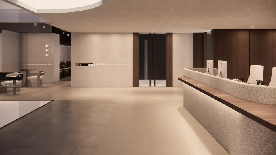 View past the reception desk to the cryotherapy entrance and the café