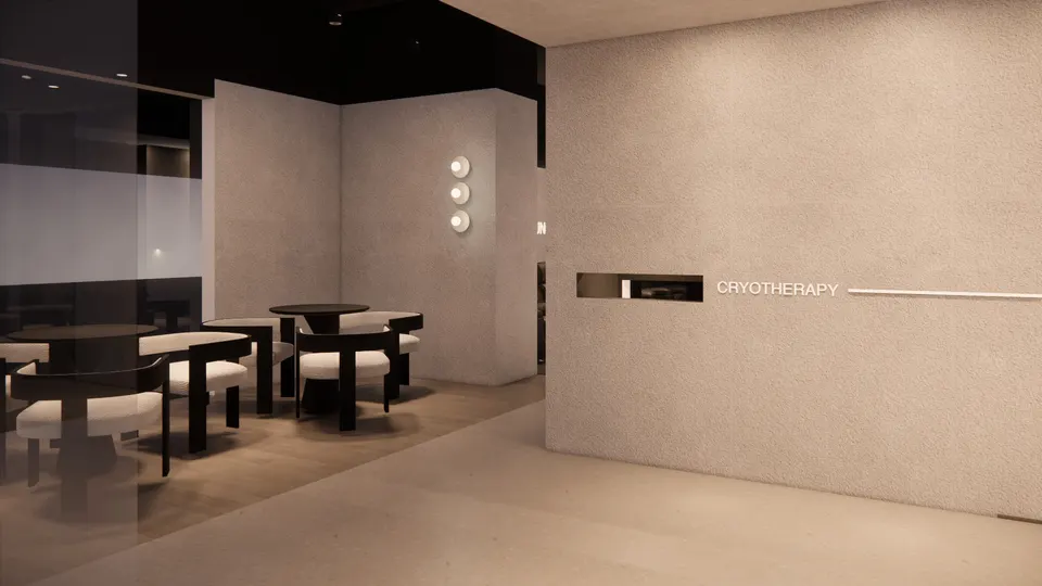 Café seating beside a plaster wall with cryotherapy signage