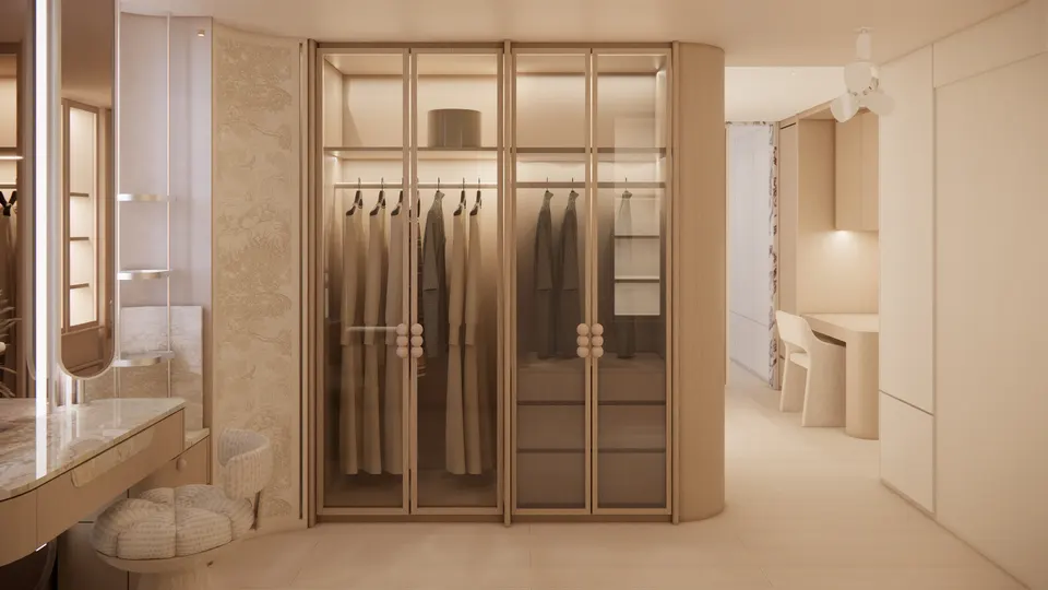 Glass-fronted wardrobe with warm internal lighting
