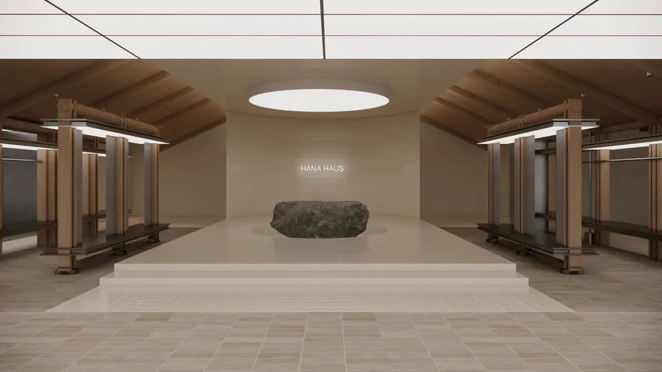 Tiled platform with a boulder beneath a round ceiling light, flanked by timber display frames