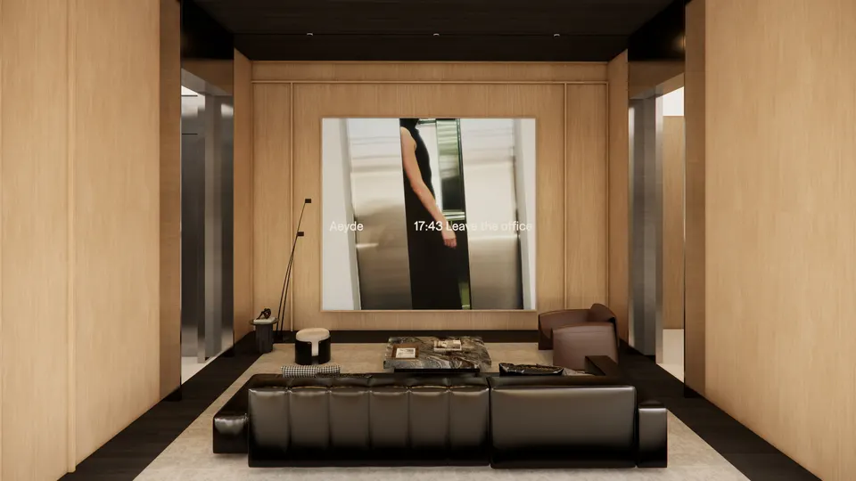 Lounge with timber walls, a black leather sofa and a large screen