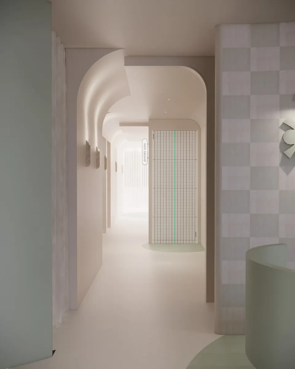 Arched corridor leading to a wall-mounted posture grid