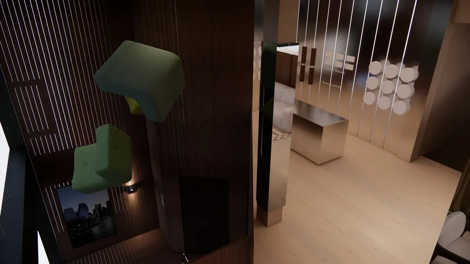 Atrium seen from above, with green armchairs suspended over the lobby
