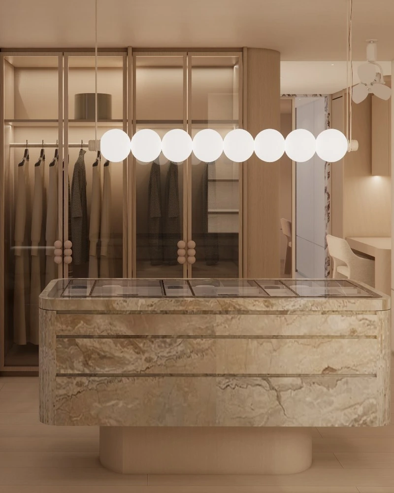 An HDB home of cream stone and soft, forgiving light.