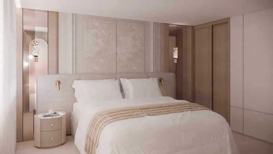 Bed with an upholstered headboard beneath a carved wall panel