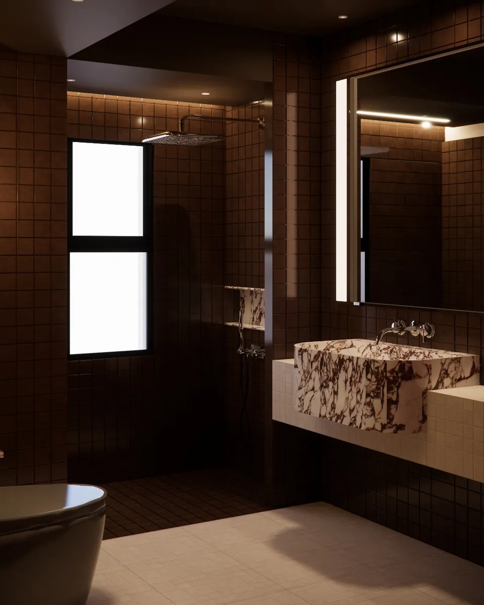Dark tiled shower beside a veined marble basin